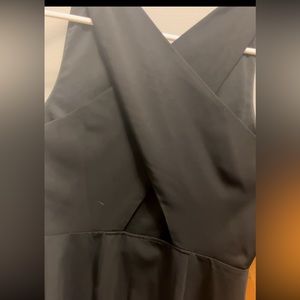 Never worn. Cross back detail in second pic. Excellent condition